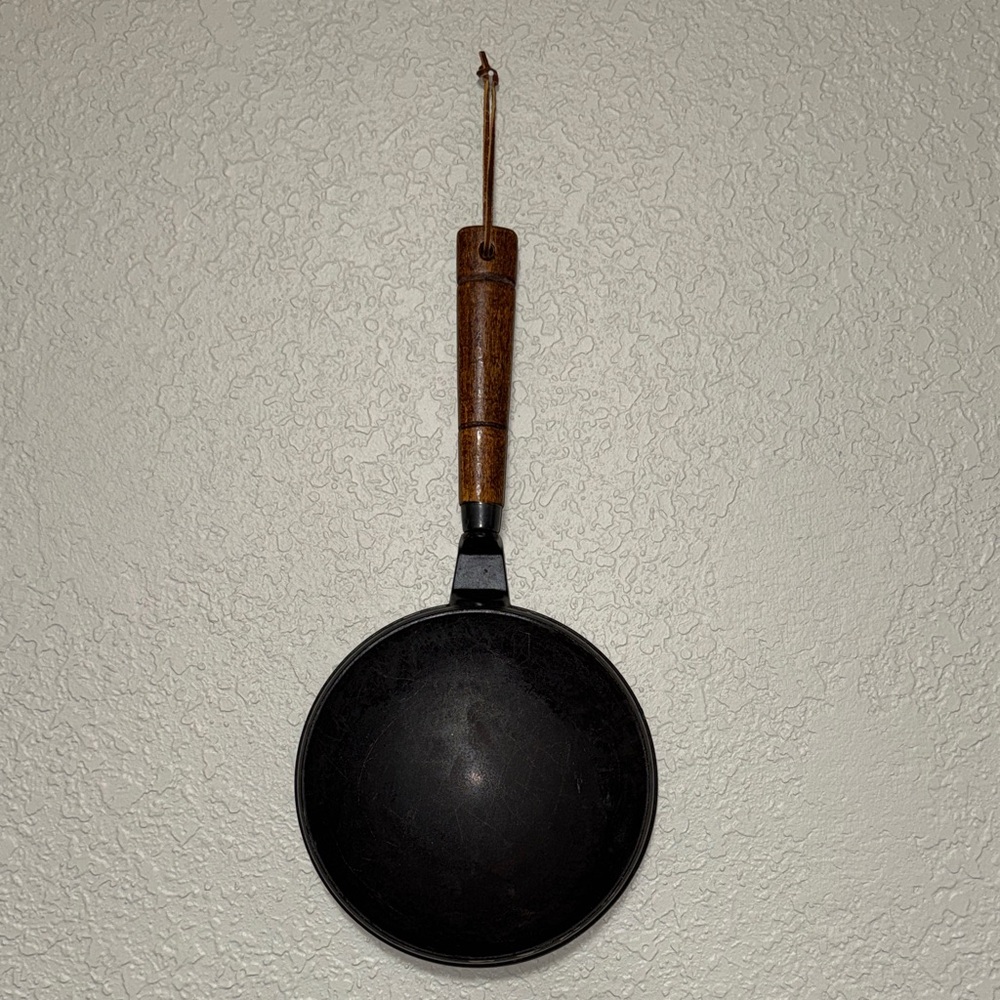 Nordic Ware Black Skillet with Brown Wooden Handle